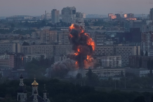 Fire and smoke rise following an explosion during a huge Russian missile and drone strike on Kyiv, Ukraine, on Sunday. Photo: Reuters