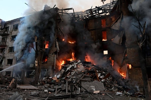Firefighters work at the scene of a fire in a destroyed block of flats following a Russian missile attack in Kyiv, Ukraine on Sunday. Photo: SOPA Images via ZUMA Press Wire / dpa Firefighters work at the scene of a fire in a destroyed block of flats following a Russian missile attack in Kyiv, Ukraine on Sunday. Photo: SOPA Images via ZUMA Press Wire / dpa