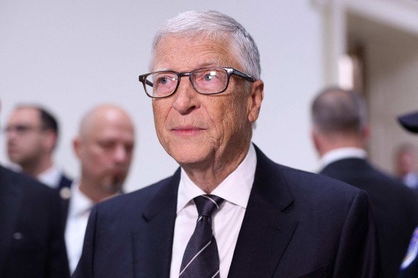 Bill Gates stops to speak to the media on Wednesday. Photo: AFP Bill Gates stops to speak to the media on Wednesday. Photo: AFP