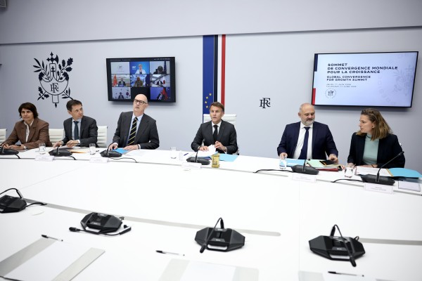 French President Emmanuel Macron (centre) chairs an international videoconference on global growth. Photo: EPA
