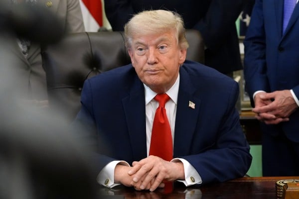 US President Donald Trump is seen in the Oval Office of the White House on Thursday. Photo: AP US President Donald Trump is seen in the Oval Office of the White House on Thursday. Photo: AP