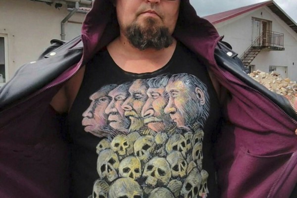 Russian artist Robert Kuzovkov, also known by his artistic pseudonym Semyon Skrepetsky, shows off a T-shirt with one of his works. Photo: Facebook/Reuters