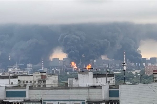 Thick plumes of smoke and flames rise from an oil refinery in Moscow on Thursday. Photo: Social media via Reuters Thick plumes of smoke and flames rise from an oil refinery in Moscow on Thursday. Photo: Social media via Reuters