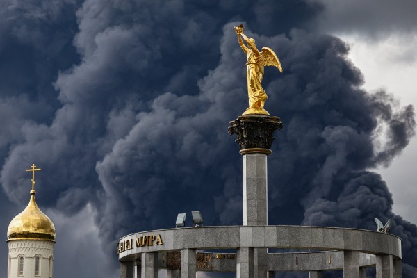 Smoke billows behind an Orthodox church following a reported Ukrainian drone attack, in Moscow, Russia, on Thursday. Photo: EPA