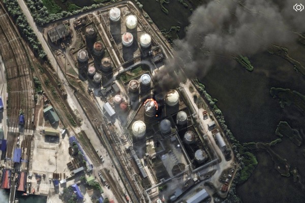 A satellite image shows smoke rising from an oil storage fire at Russia’s Kavkaz Port on June 21. Kyiv has stepped up its drone campaign inside Russia. Photo: Vantor via Reuters
