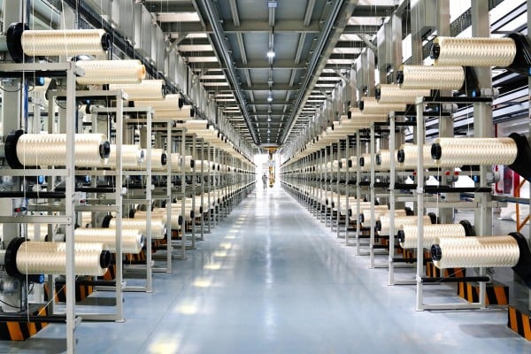 State-owned CNBM has launched three production lines in east China’s Jiangsu province for high-strength carbon fibre. Photo: Handout State-owned CNBM has launched three production lines in east China’s Jiangsu province for high-strength carbon fibre. Photo: Handout