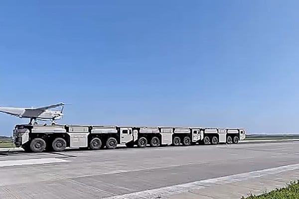 A drone is launched from an electromagnetic catapult system using interconnected trucks that form a continuous platform. Photo: BIT/WeChat A drone is launched from an electromagnetic catapult system using interconnected trucks that form a continuous platform. Photo: BIT/WeChat