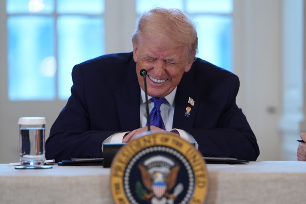 US President Donald Trump enjoys a light moment during a meeting with oil executives in the East Room of the White House in Washington on January 9. Photo: AP US President Donald Trump enjoys a light moment during a meeting with oil executives in the East Room of the White House in Washington on January 9. Photo: AP