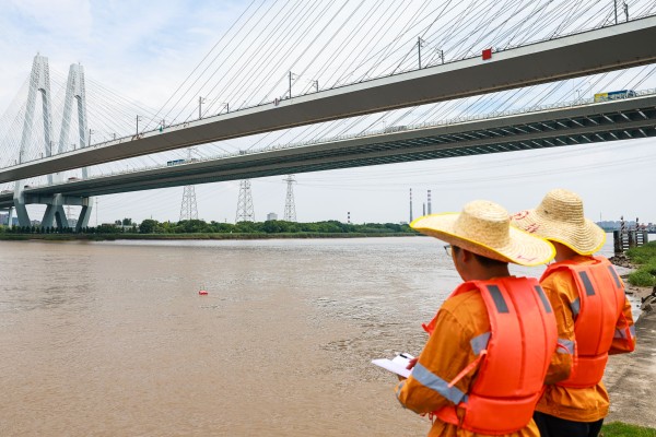 Railway workers inspect a bridge in Ningbo City, eastern China’s Zhejiang province, ahead of Typhoon Bavi making landfall on the Chinese mainland. Photo: Xinhua