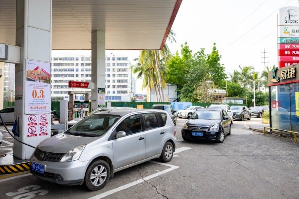 A car is refuelled at a petrol station in China’s Hainan province in March as other vehicles queue. Photo: CFOTO/Future Publishing via Getty Images A car is refuelled at a petrol station in China’s Hainan province in March as other vehicles queue. Photo: CFOTO/Future Publishing via Getty Images