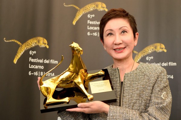Shi Nan-sun with her award for best independent producer at the 67th Locarno International Film Festival in 2014. Photo: EPA