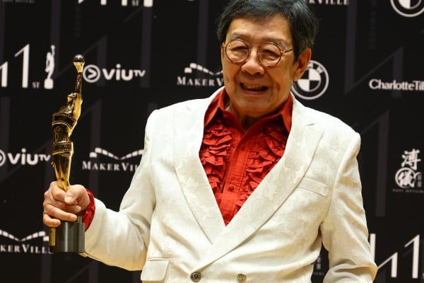 Hong Kong actor and singer Bowie Woo with his Lifetime Achievement Award at the 41st Hong Kong Film Awards at the Hong Kong Cultural Centre in Tsim Sha Tsui, on April 16, 2023. Woo set a Guinness World Record in June 2026 as the oldest Chinese artist to hold a solo concert at the age of 94. Photo: Dickson Lee Hong Kong actor and singer Bowie Woo with his Lifetime Achievement Award at the 41st Hong Kong Film Awards at the Hong Kong Cultural Centre in Tsim Sha Tsui, on April 16, 2023. Woo set a Guinness World Record in June 2026 as the oldest Chinese artist to hold a solo concert at the age of 94. Photo: Dickson Lee