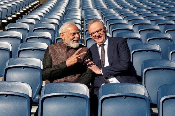 Indian Prime Minister Narendra Modi and his Australian counterpart Anthony Albanese pose for a picture in the stands at the Melbourne Cricket Ground on July 10. Photo: Reuters