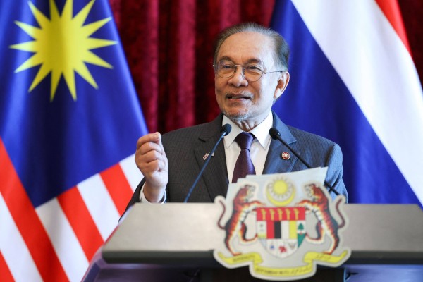 Malaysia’s Prime Minister Anwar Ibrahim speaks during a press conference  at the federal government office in Putrajaya on July 9. Photo: AFP