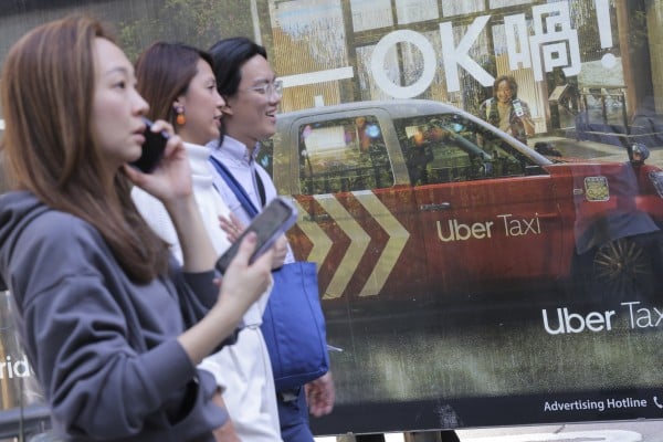 An Uber Taxi advertisement at Nathan Road, Tsim Sha Tsui, on November 21, 2023. Ride-hailing services have captured 22 per cent of Hong Kong’s point-to-point transport market with 114,000 daily trips. Photo: Jelly Tse An Uber Taxi advertisement at Nathan Road, Tsim Sha Tsui, on November 21, 2023. Ride-hailing services have captured 22 per cent of Hong Kong’s point-to-point transport market with 114,000 daily trips. Photo: Jelly Tse