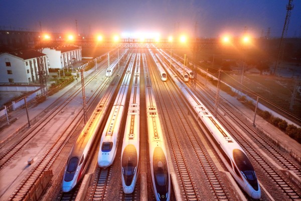 (260630) -- BEIJING, June 30, 2026 (Xinhua) -- A drone photo taken on June 30, 2026 shows high-speed trains stabled at a storage yard in Lianyungang, east China’s Jiangsu Province. Starting from 00:00 on July 1, China’s railway diagram will be adjusted by adding 106 passenger train services and 111 freight train service to the current schedule. After the adjustment, a total of 12,174 passenger trains will be scheduled nationwide, while 23,975 freight trains will be operated. (Photo by Wang Chun/Xinhua)