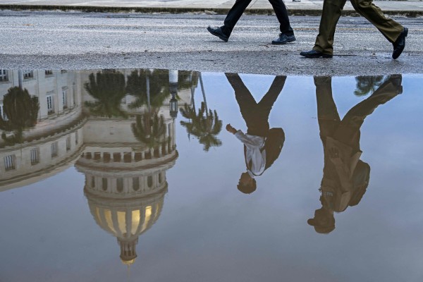 The Havana Capitol is seen reflected in a puddle on July 11. Photo: AFP The Havana Capitol is seen reflected in a puddle on July 11. Photo: AFP