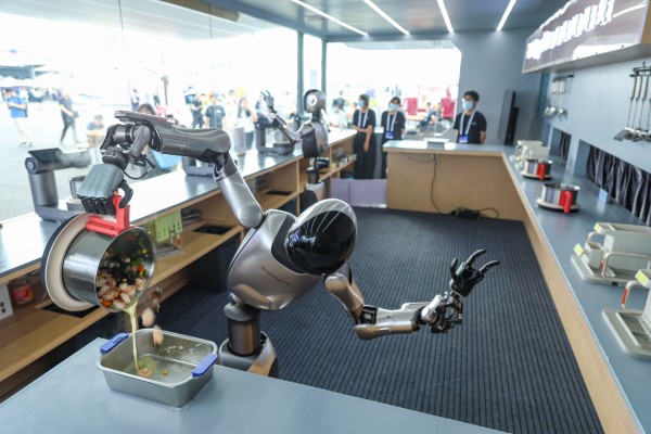 Robbyant, an embodied intelligence company under Ant Group, showcases its R1 robot, which is capable of cooking complete meals with minimal human intervention, at the technology exhibition during the 2025 Inclusion Conference in Shanghai on September 12, 2025. Photo: VCG via Getty Images