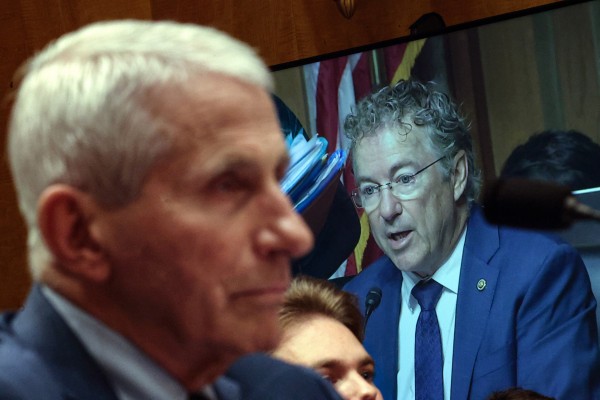 Committee Chairman US Senator Rand Paul is shown on a monitor as former NIH director Anthony Fauci (left) testifies before the Senate Homeland Security and Governmental Affairs Committee hearing on July 29 in Washington, DC. Photo: TNS Committee Chairman US Senator Rand Paul is shown on a monitor as former NIH director Anthony Fauci (left) testifies before the Senate Homeland Security and Governmental Affairs Committee hearing on July 29 in Washington, DC. Photo: TNS