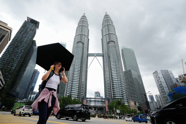 The Petronas Twin Towers in Kuala Lumpur, Malaysia. South Korean companies can use Malaysia as a gateway to Asean, Malaysian officials say. Photo: AP The Petronas Twin Towers in Kuala Lumpur, Malaysia. South Korean companies can use Malaysia as a gateway to Asean, Malaysian officials say. Photo: AP
