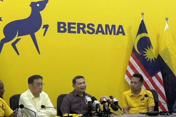 Wong Chen (left), joins Rafizi Ramli (centre) and Nik Nazmi Nik Ahmad  at a press conference at Bersama’s headquarters on Wednesday. Photo: Iman Muttaqin Yusof

