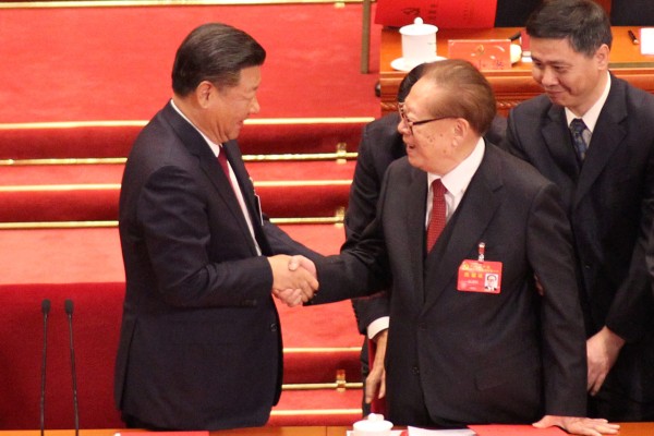 Chinese President Xi Jinping (left) shakes hands with former leader Jiang Zemin at the 19th national party congress in 2017. Photo: Simon Song