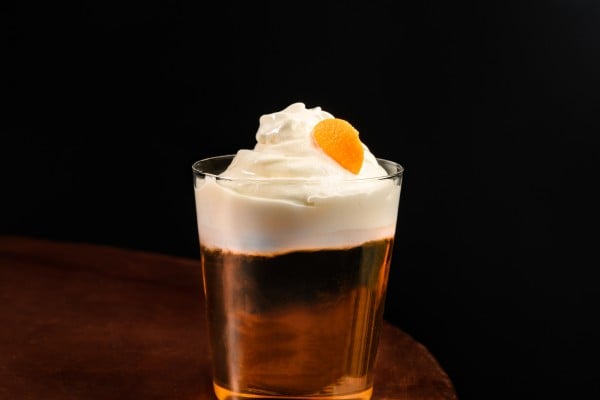 Barc’s Orangecello merges rum with vanilla, alongside Barc’s housemade orangecello and a creamy foam made from Aylā, a Newari distilled liquor made from rice, grain or millet. Photo: Handout