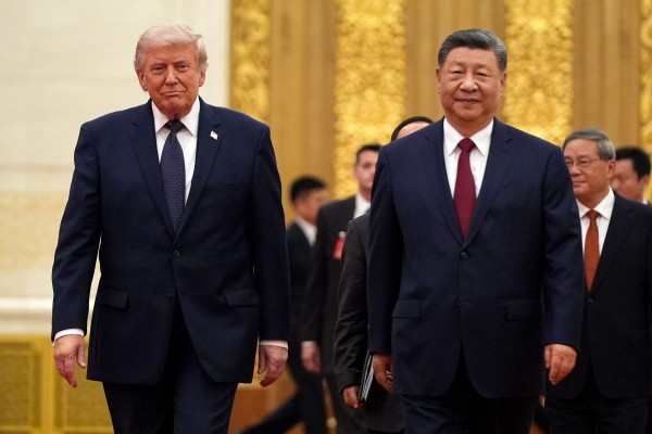 US President Donald Trump and Chinese President Xi Jinping arrive during a state dinner at the Great Hall of the People in Beijing on May 14. File photo: AP