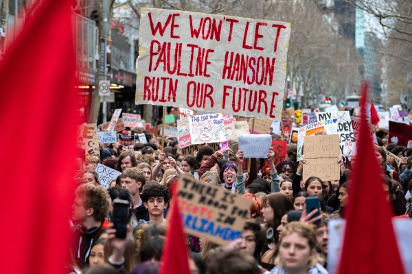High school and university students opposed to the policies of Pauline Hanson and her far-right One Nation Party march through Melbourne on Thursday. Photo: dpa