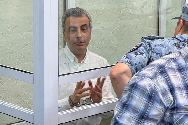 Lev Shlosberg, deputy chairman of the Yabloko party, attends a court hearing in Pskov, Russia on Monday. Photo: Reuters Lev Shlosberg, deputy chairman of the Yabloko party, attends a court hearing in Pskov, Russia on Monday. Photo: Reuters