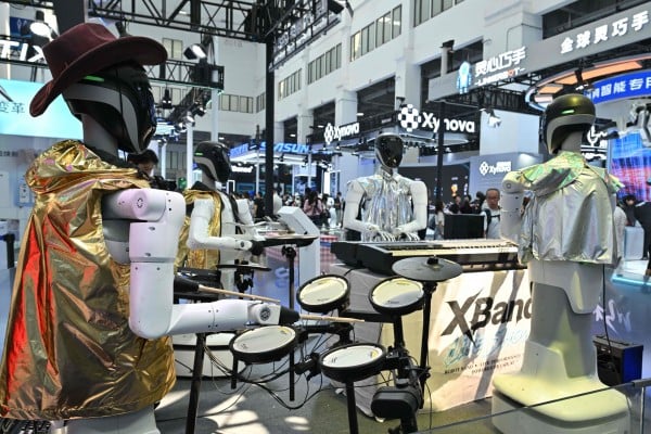 A robot band plays music during the 2026 World Robot Conference in Beijing on Wednesday. Photo: AFP