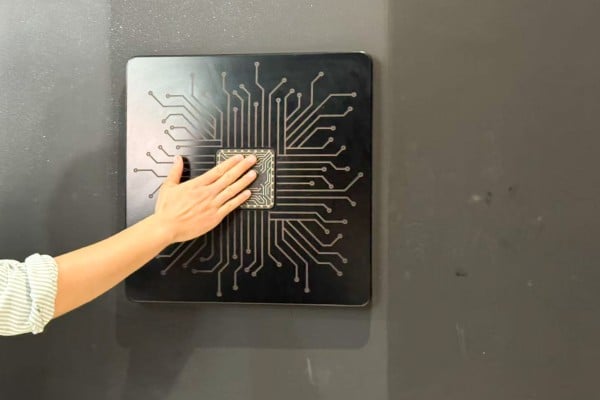 A button shaped like a silicon chip unlocks the exhibition hall at a Shanghai AI research institute. Photo: Wency Chen