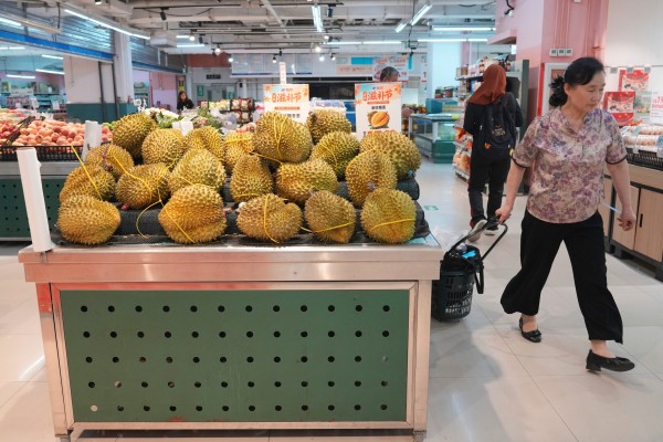 Expanding supply and faster cross-border cold-chain links are driving down durian prices for Chinese consumers. Photo: AP