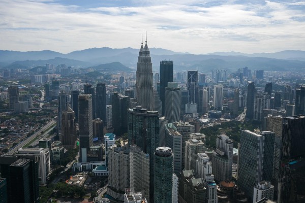 The Petronas Twin Towers and other commercial buildings as seen from KL Tower in Kuala Lumpur. Photo: AFP