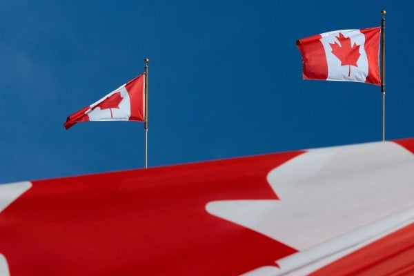 The closure of Canada’s “lifeboat” migration scheme for Hongkongers has left some applicants who are struggling to meet permanent residency requirements in limbo. Photo: AFP The closure of Canada’s “lifeboat” migration scheme for Hongkongers has left some applicants who are struggling to meet permanent residency requirements in limbo. Photo: AFP