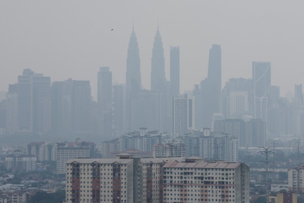 The skyline of Malaysia’s Kuala Lumpur is seen shrouded in haze from regional wildfires on Wednesday. Photo: Reuters