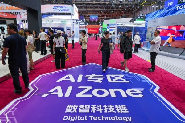 Visitors tour exhibition booths at the China International Supply Chain Expo in Beijing on June 25. Photo: AP Visitors tour exhibition booths at the China International Supply Chain Expo in Beijing on June 25. Photo: AP