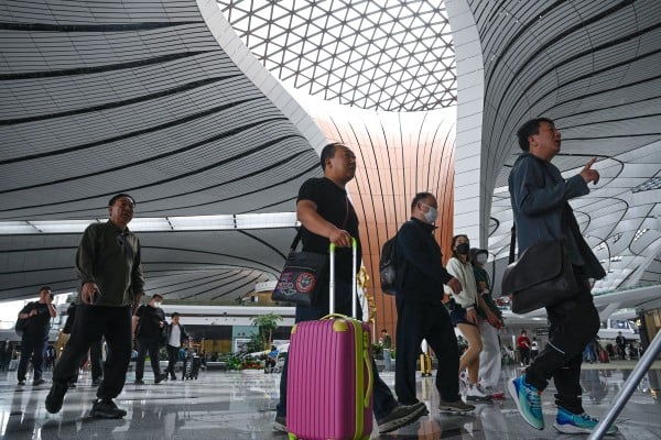 Chinese airlines transported 153.64 million passenger trips between July 1 and Monday, a historic high. Photo: AFP Chinese airlines transported 153.64 million passenger trips between July 1 and Monday, a historic high. Photo: AFP