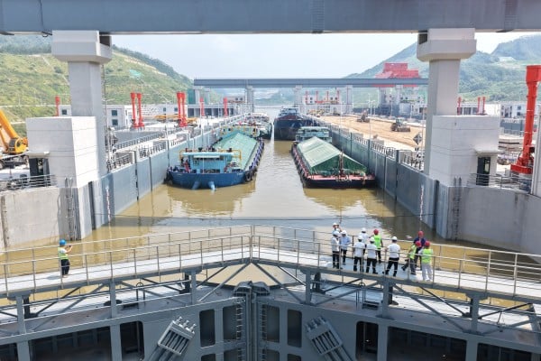 Trial vessels are seen at a navigation lock on the Pinglu Canal in China’s Guangxi Zhuang autonomous region on August 12. Photo: Xinhua
