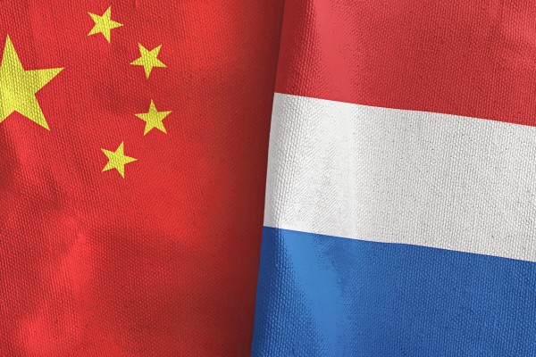 Flags of China and the Netherlands appear next to each other. Photo: Shutterstock