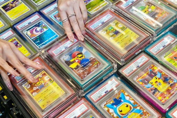 Visitors browse rare Pokemon cards at the Grade 10 Festival in Hong Kong, which featured a Van Gogh-inspired Pikachu card wall valued at HK$5 million. Photo: Karma Lo Visitors browse rare Pokemon cards at the Grade 10 Festival in Hong Kong, which featured a Van Gogh-inspired Pikachu card wall valued at HK$5 million. Photo: Karma Lo