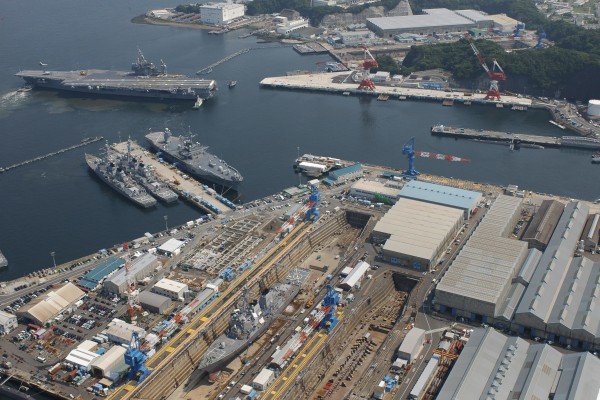 The USS Kitty Hawk backs into pier in Yokosuka, Japan. The ship repair capacity of regional allies in the western Pacific is essential to US naval capabilities. Photo: US Navy