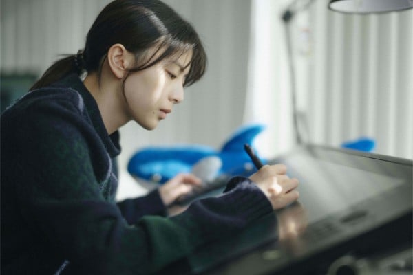 Natsuki Deguchi as the grown-up Fujino in a still from Look Back (category I, Japanese), directed by Hirokazu Koreeda. Aju Makita, Furi Nanase and Rokka Okada co-star.
Natsuki Deguchi as the grown-up Fujino in a still from Look Back (category I, Japanese), directed by Hirokazu Koreeda. Aju Makita, Furi Nanase and Rokka Okada co-star.
