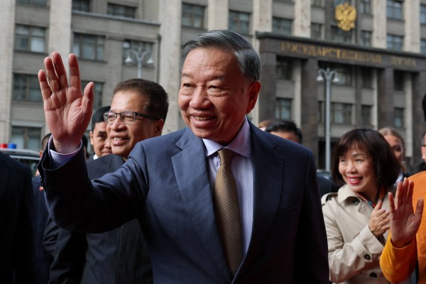To Lam, Vietnam’s president and general secretary of its Communist Party, waves to members of a welcoming delegation in Moscow on Monday. Photo: Reuters