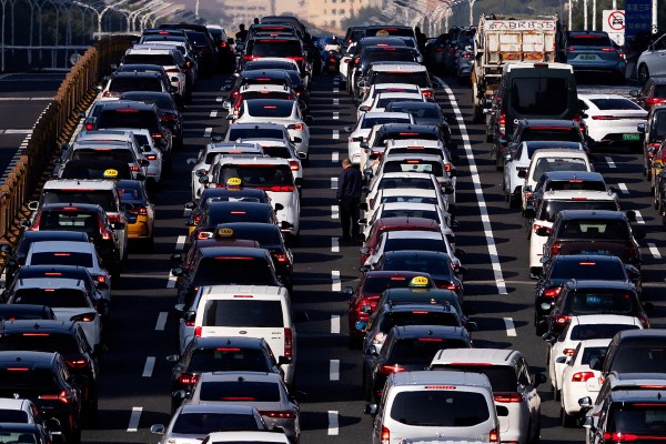 Traffic is gridlocked during the morning rush hour on a sunny day in Beijing. Photo: Reuters