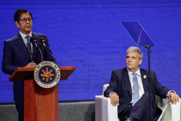Philippine President Ferdinand Marcos Jnr (left) delivers a speech as US Trade and Development Agency Deputy Director Thomas Hardy looks on during the Luzon Economic Corridor Investment Forum in Taguig City on Thursday. Photo: EPA Philippine President Ferdinand Marcos Jnr (left) delivers a speech as US Trade and Development Agency Deputy Director Thomas Hardy looks on during the Luzon Economic Corridor Investment Forum in Taguig City on Thursday. Photo: EPA