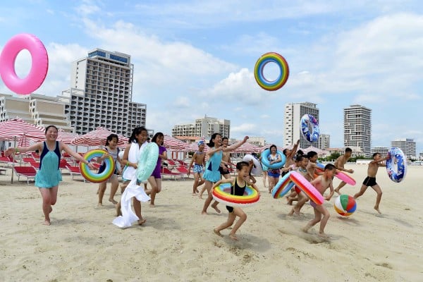 Visitors cavort at the Wonsan Kalma tourist area in Kangwon province, North Korea, last year. Photo: Kyodo Visitors cavort at the Wonsan Kalma tourist area in Kangwon province, North Korea, last year. Photo: Kyodo
