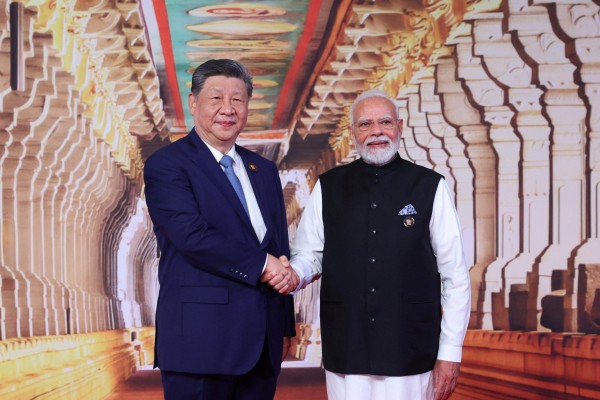 Chinese President Xi Jinping with Indian  Prime Minister Narendra Modi at the Brics summit venue in New Delhi on Saturday. Photo: via Reuters