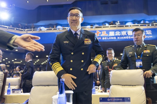 Chinese Defence Minister Dong Jun arrives for the opening ceremony of the Xiangshan Forum in Beijing on Wednesday. Photo: EPA