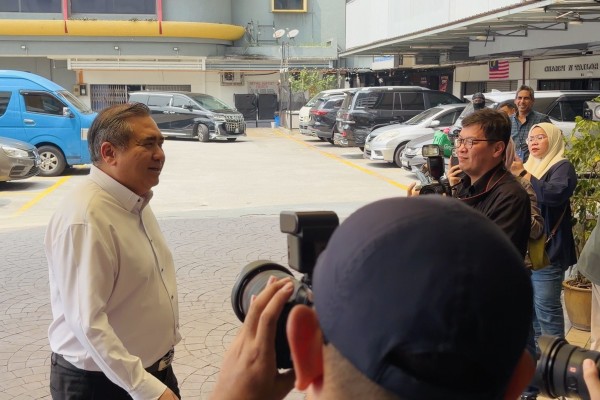 DAP secretary general Anthony Loke arrives at his party's headquarters on Saturday afternoon. Photo: Ushar Daniele
